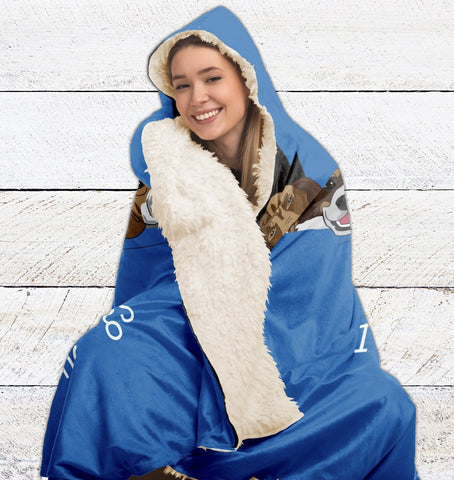 girl wrapped in warm fuzzy blanket
